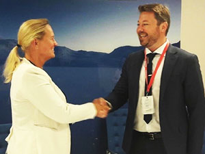 Elisabeth Vike Vardheim, EVP Constructions at Statnett, and Espen Bostadløkken, Norway Country Manager, Grid Solutions, GE Power, shake hands after signing the contract to build a new substation in Oslo, Norway